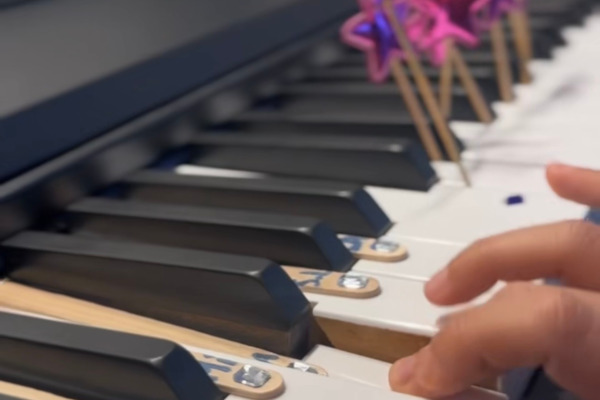 Student performing classical piano piece during recital preparation session. Location is Northern Virginia